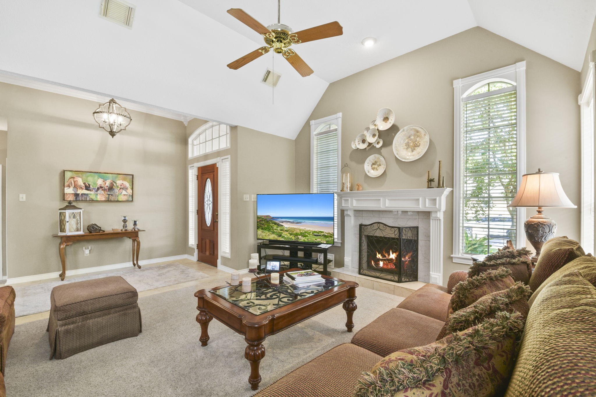 5827 Ashmere Lane Spring, TX 77379 - Photo 11 of 50 a living room with furniture and a fireplace