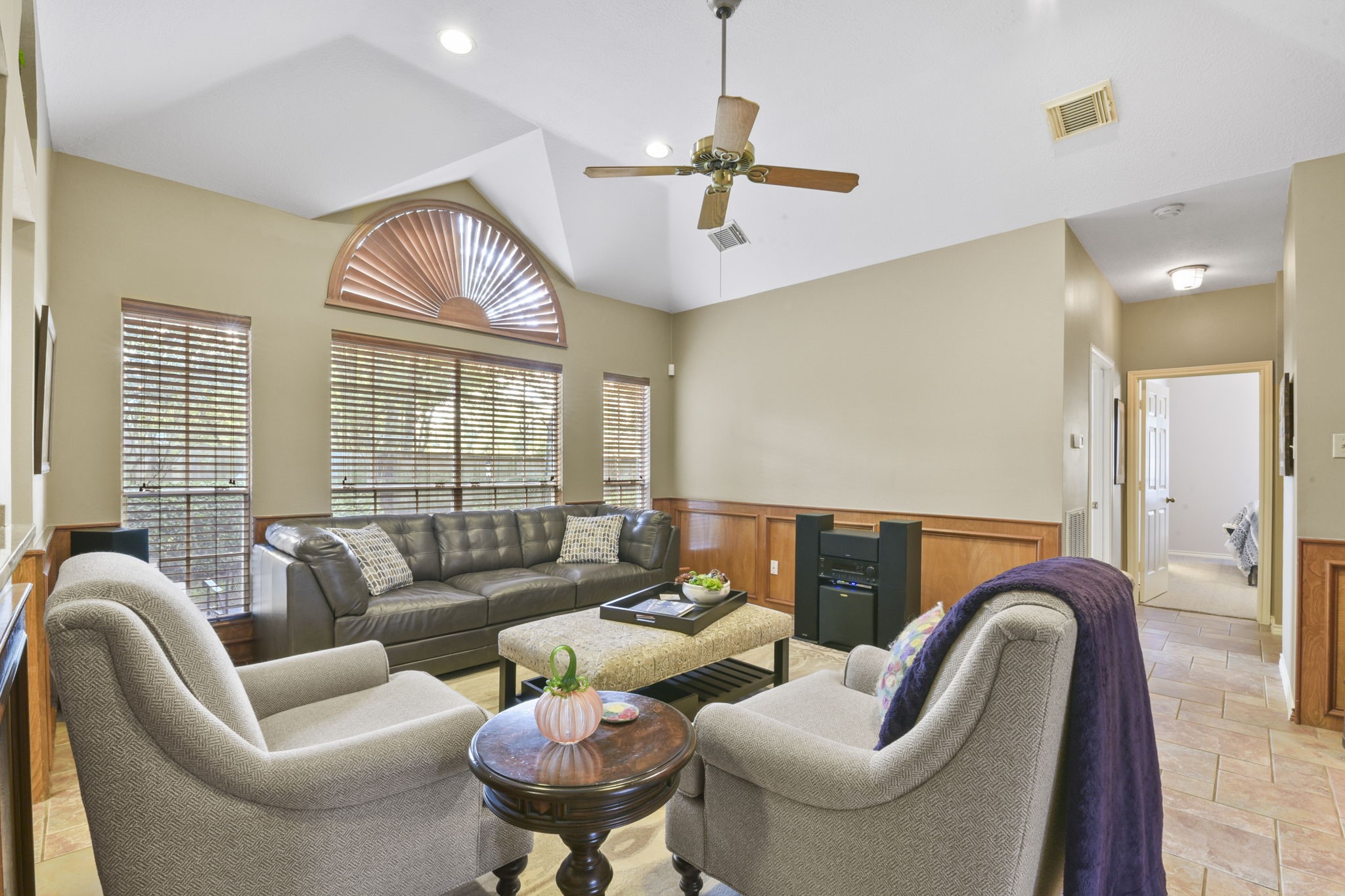 5827 Ashmere Lane Spring, TX 77379 - Photo 20 of 50 a living room with furniture ceiling fan and a window