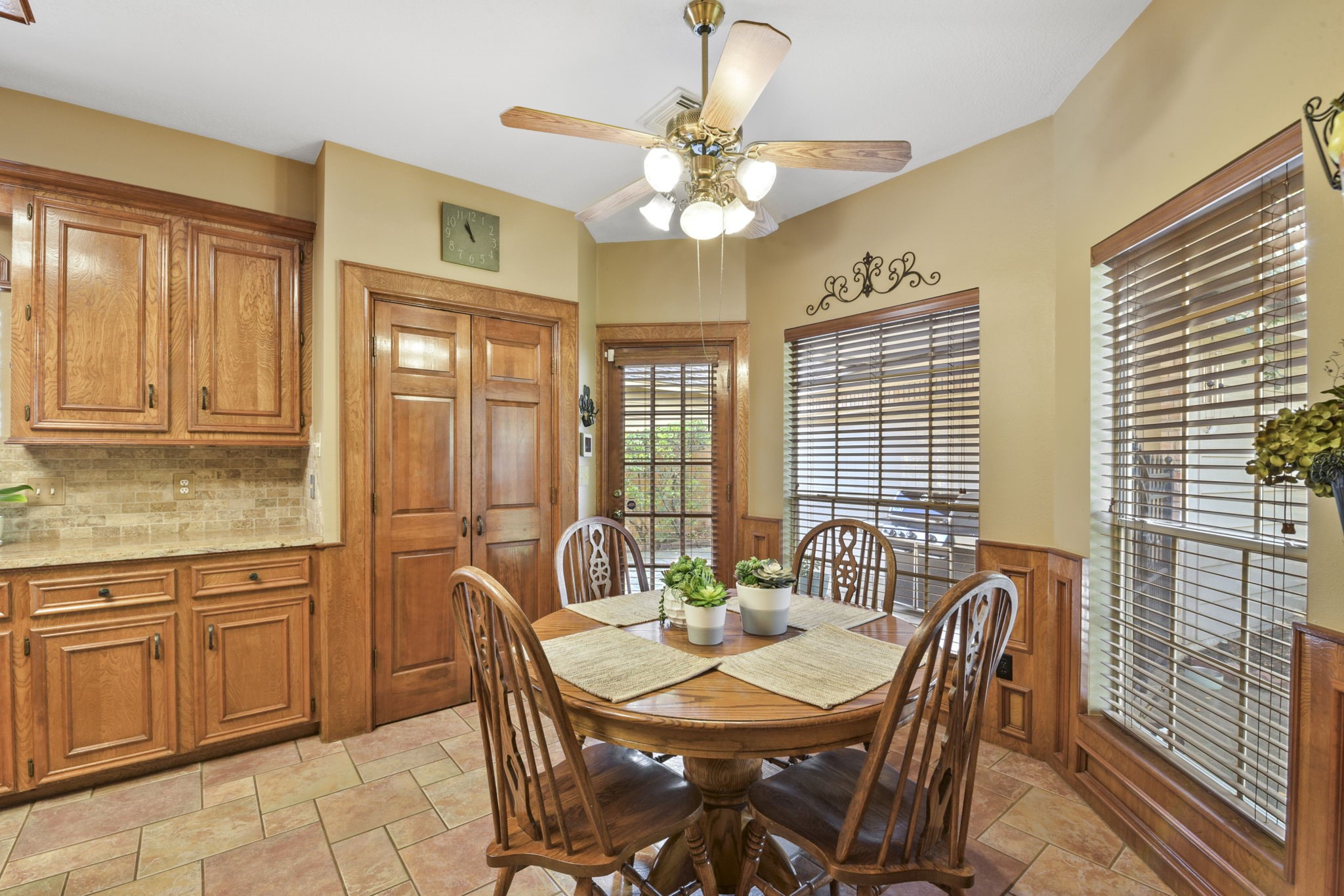 5827 Ashmere Lane Spring, TX 77379 - Photo 27 of 50 a view of a dining room with furniture wooden floor and chandelier