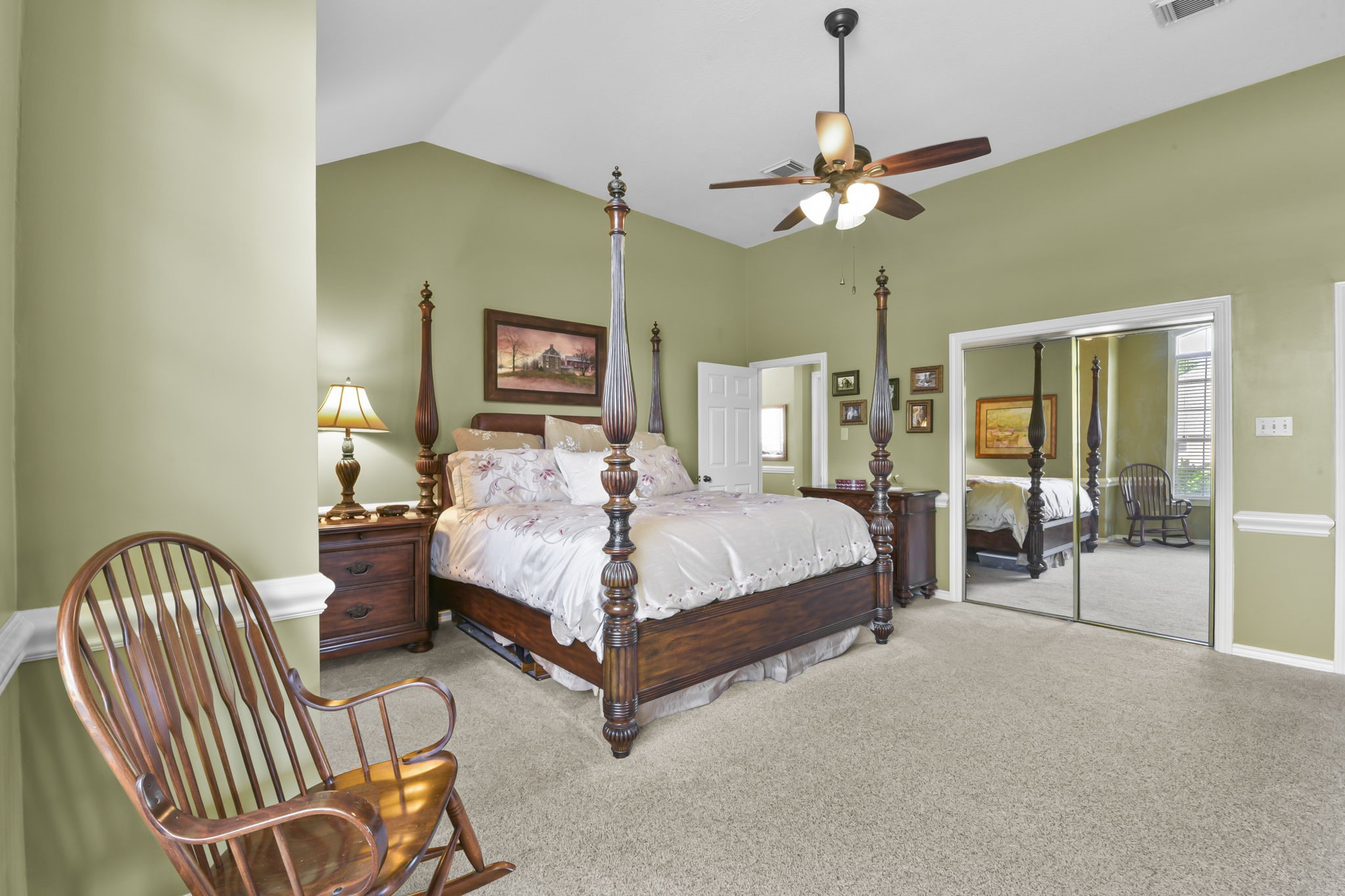 5827 Ashmere Lane Spring, TX 77379 - Photo 31 of 50 a bedroom with a bed and ceiling fan