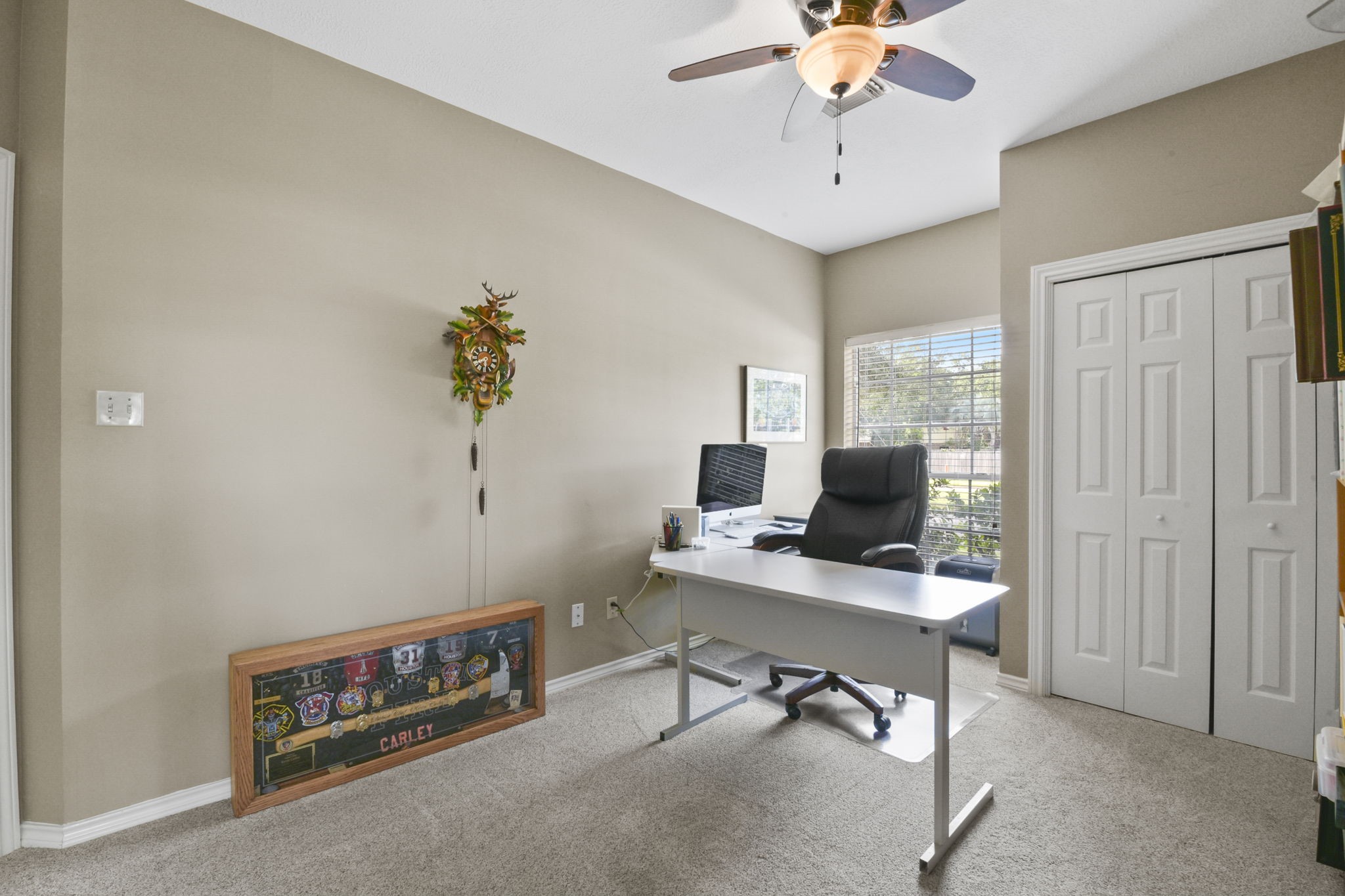 5827 Ashmere Lane Spring, TX 77379 - Photo 38 of 50 a view of a workspace with a window and shelf