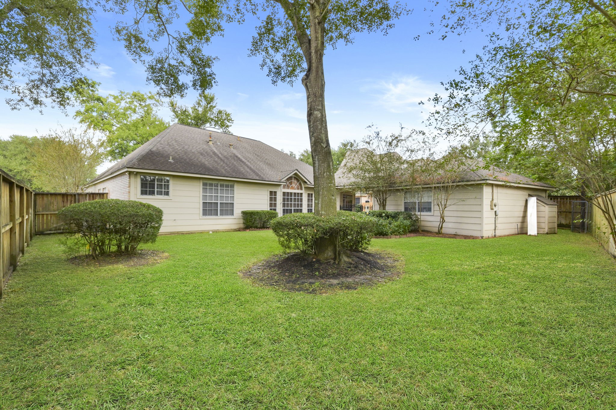 5827 Ashmere Lane Spring, TX 77379 - Photo 49 of 50 a aerial view of a house with a yard and sitting area