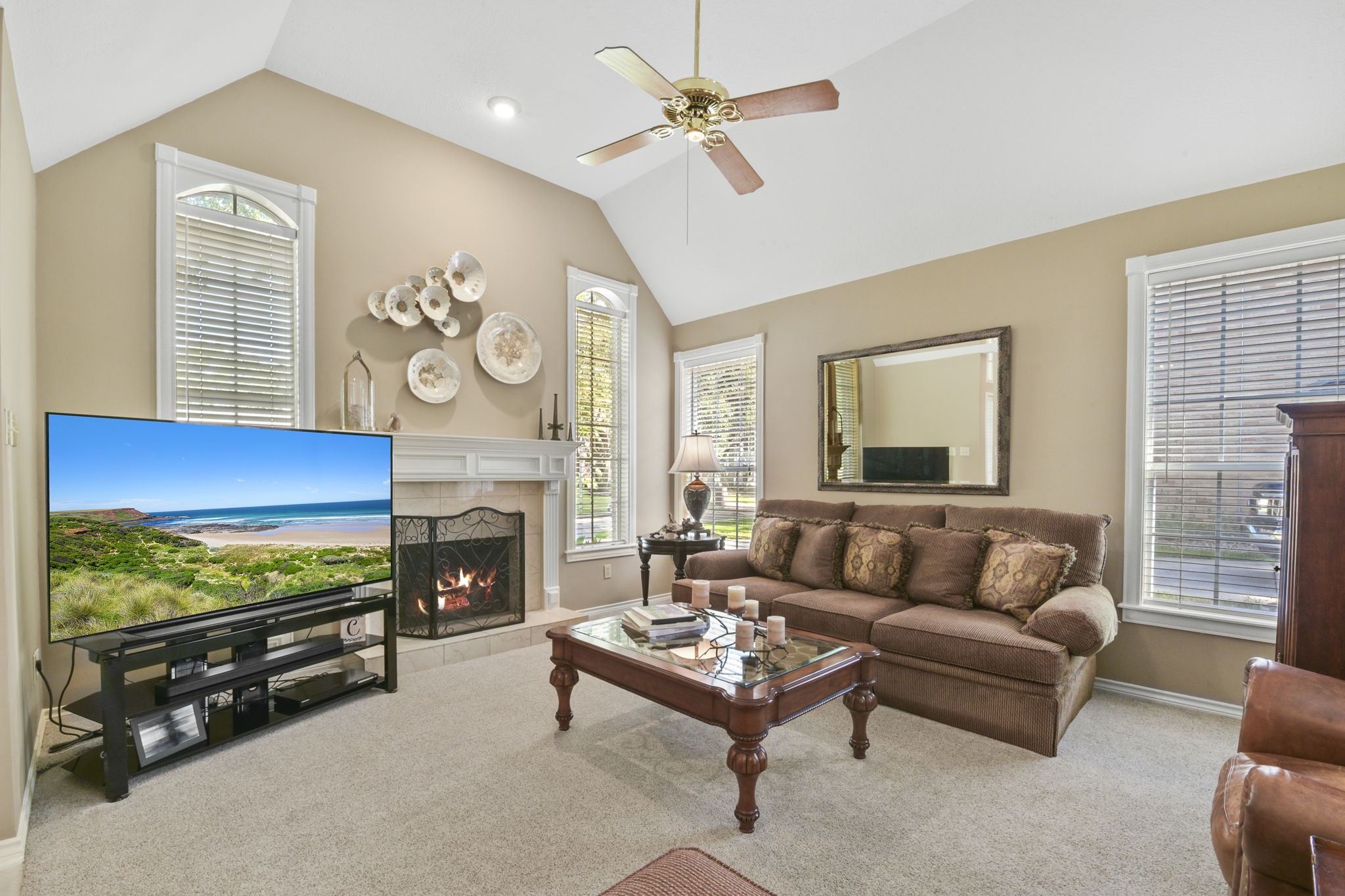 5827 Ashmere Lane Spring, TX 77379 - Photo 8 of 50 a living room with furniture and a fireplace