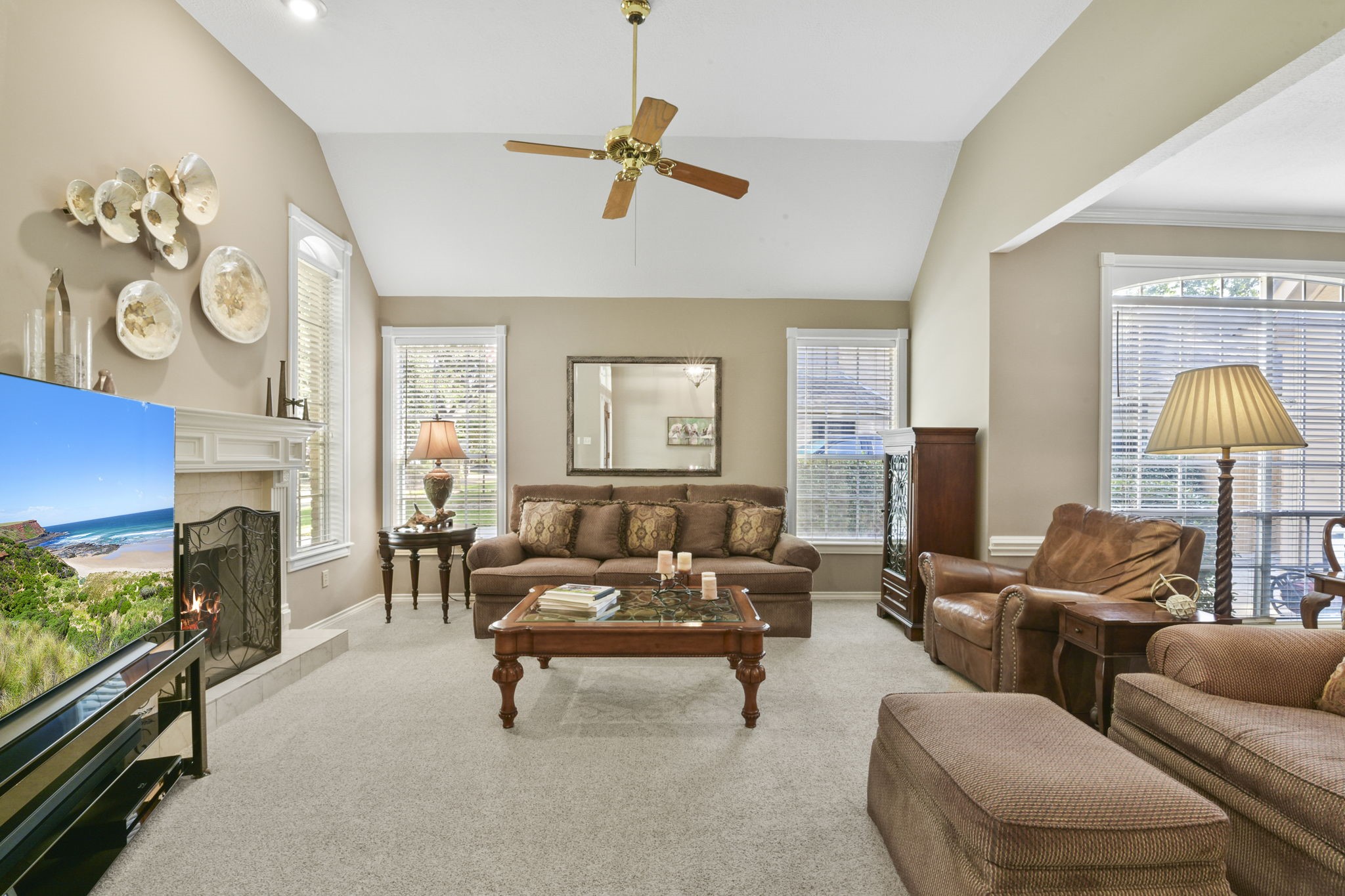 5827 Ashmere Lane Spring, TX 77379 - Photo 9 of 50 a living room with furniture and a fireplace