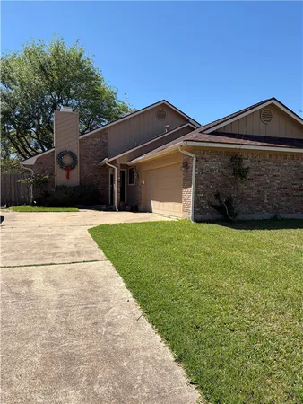 a front view of house with yard