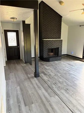 a view of a livingroom with a fireplace