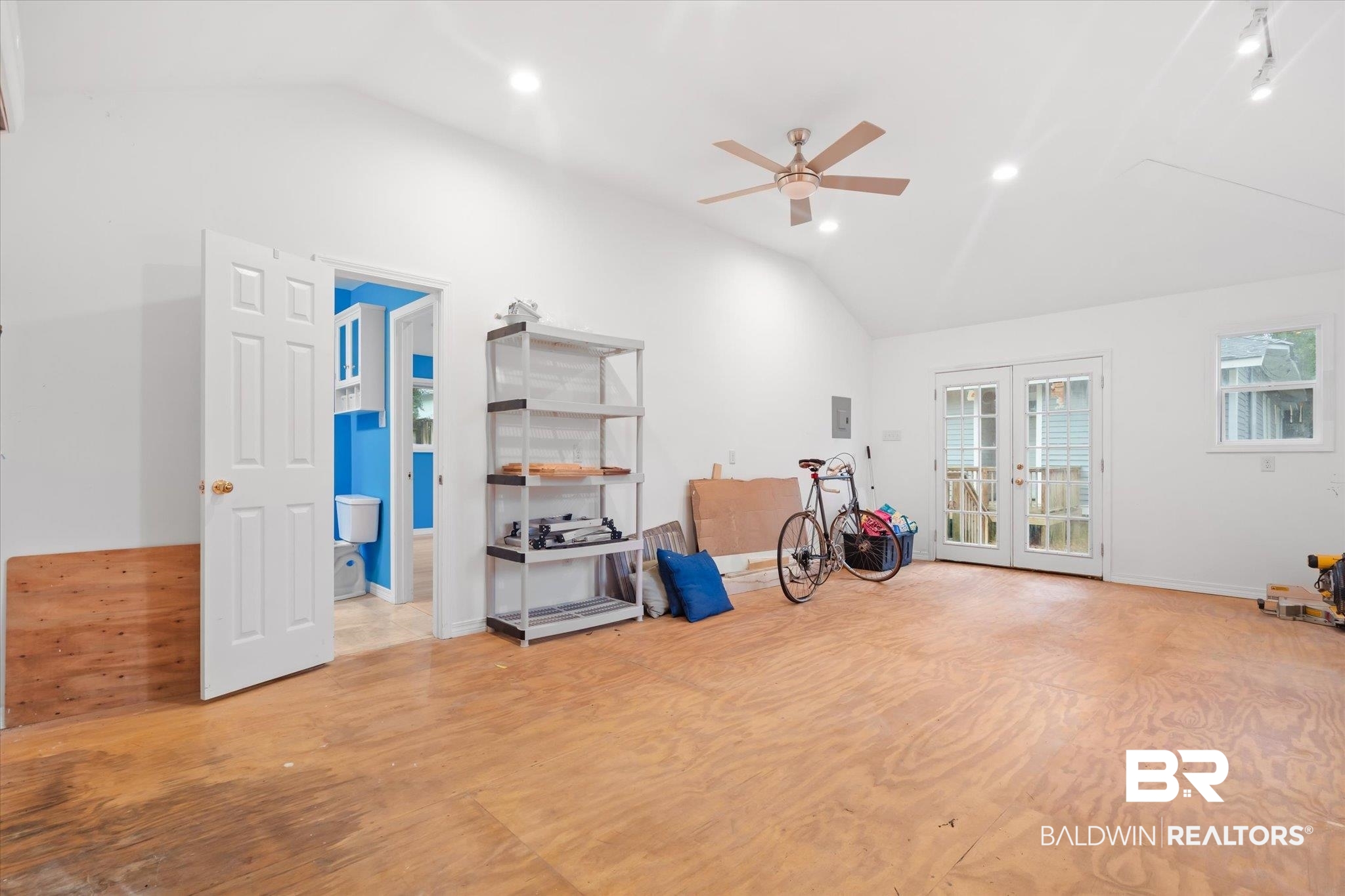 14 South Monterey Street Mobile, AL 36604 - Photo 25 of 41 Misc room featuring french doors, ceiling fan, light wood-type flooring, and vaulted ceiling