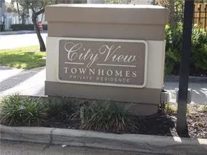 a sign broad on the side of a road