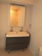 a view of a door with a wooden fence