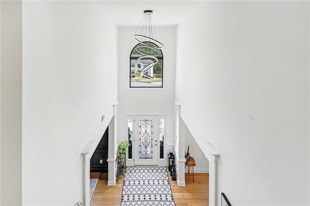 130 Serenity Way Conyers, GA 30013 - Photo 11 of 34 a view of entryway with wooden floor