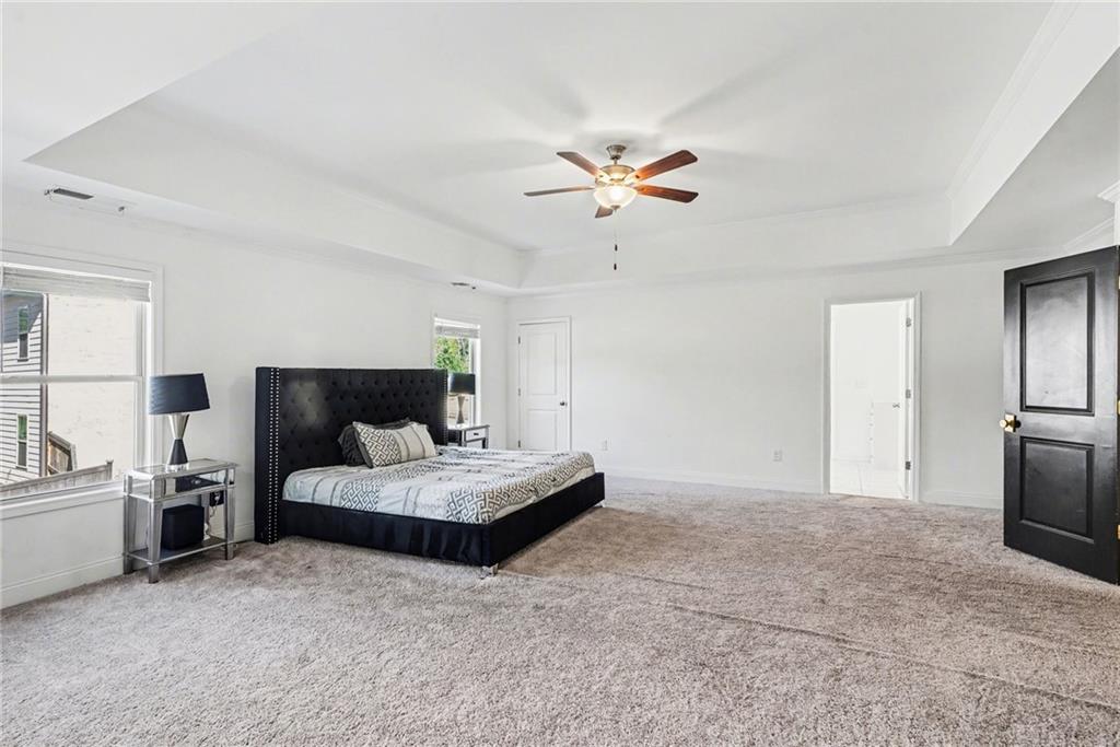 130 Serenity Way Conyers, GA 30013 - Photo 26 of 34 a living room with furniture and a couch