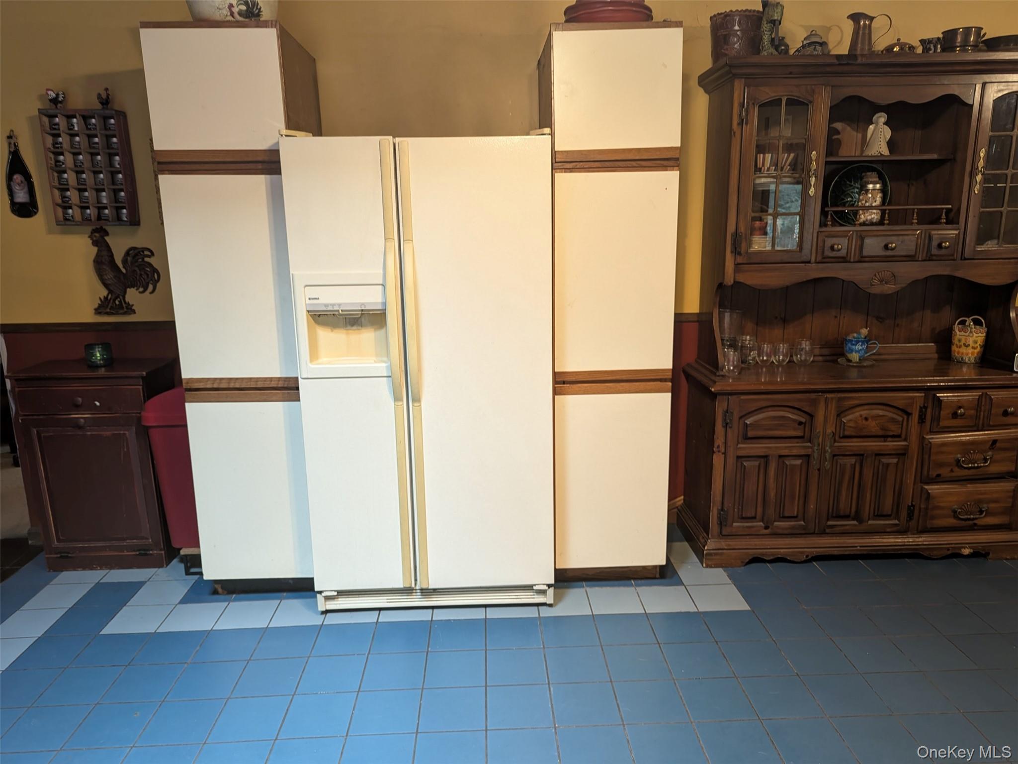 152 Old Forestburg Road Sparrowbush, NY 12780 - Photo 11 of 32 a view of washer and dryer with kitchen in the background