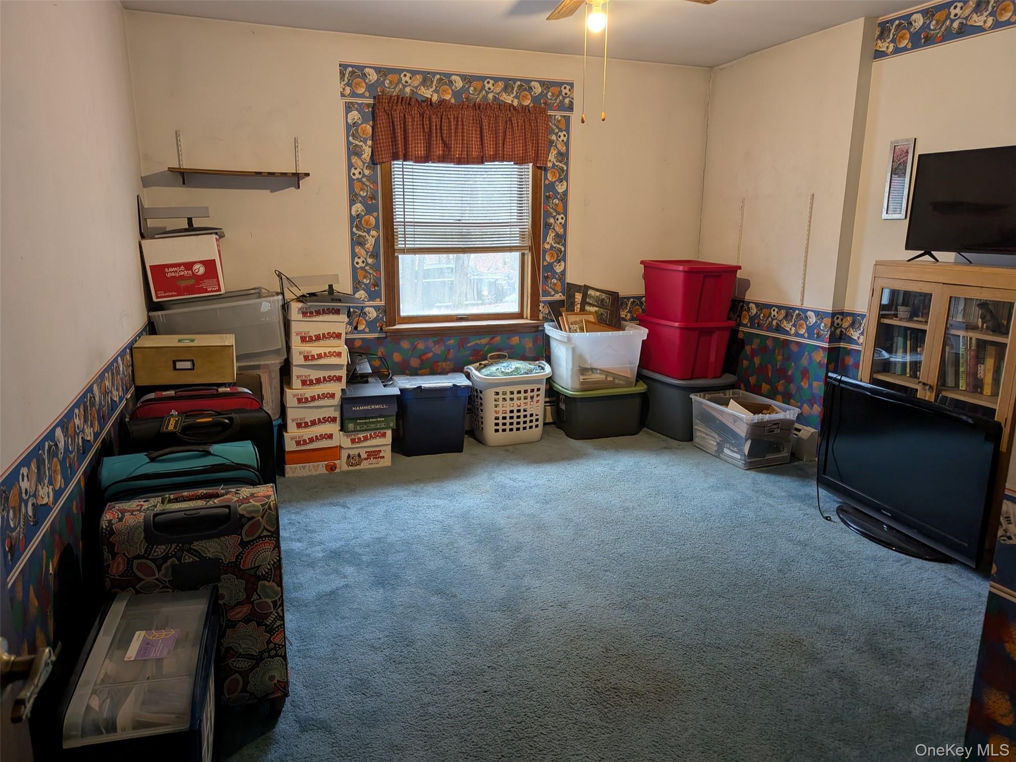 152 Old Forestburg Road Sparrowbush, NY 12780 - Photo 13 of 32 a room with furniture and a flat screen tv