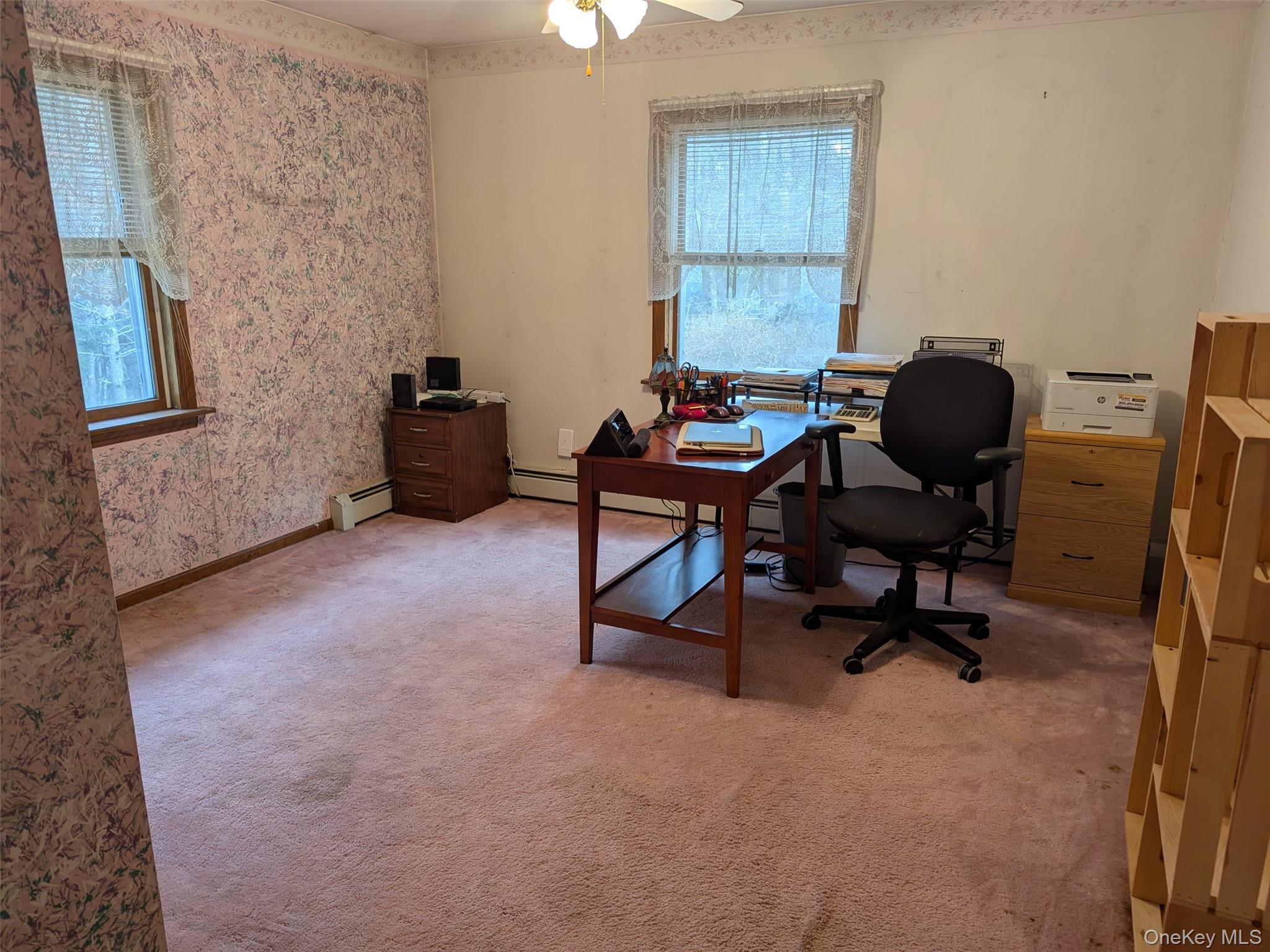 152 Old Forestburg Road Sparrowbush, NY 12780 - Photo 14 of 32 a view of a workspace with furniture and a window