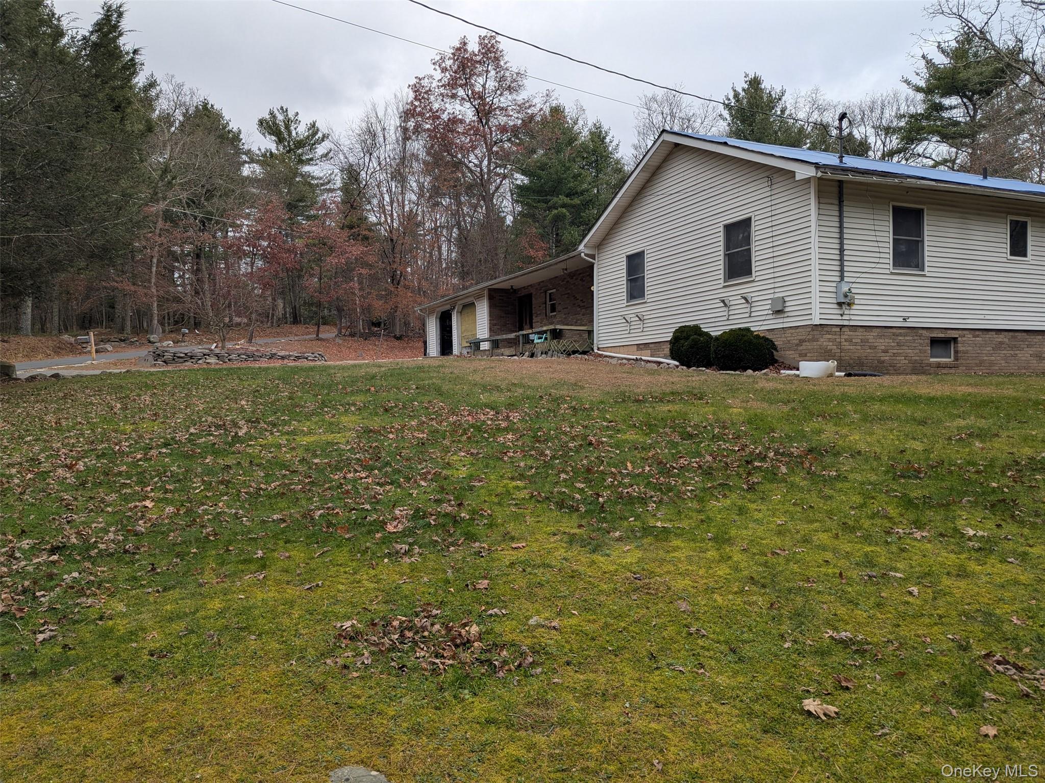152 Old Forestburg Road Sparrowbush, NY 12780 - Photo 31 of 32 a view of a house with a yard
