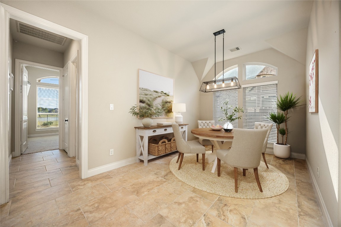 23211 Ruspino Shores Place Katy, TX 77493 - Photo 13 of 39 a view of a dining room with furniture