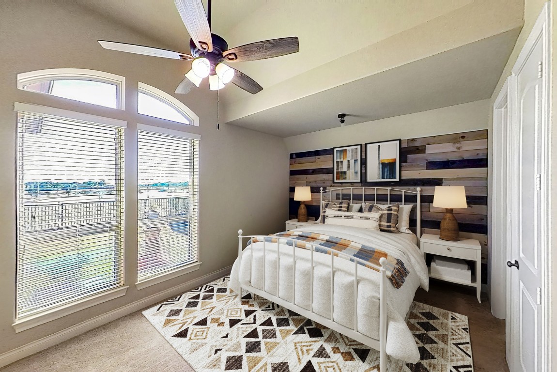 23211 Ruspino Shores Place Katy, TX 77493 - Photo 26 of 39 a bedroom with a bed and a window