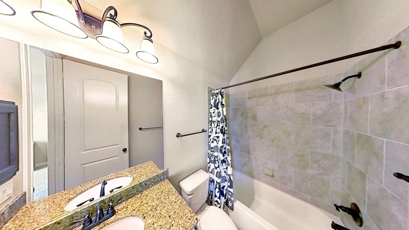 23211 Ruspino Shores Place Katy, TX 77493 - Photo 27 of 39 a bathroom with a bathtub and shower