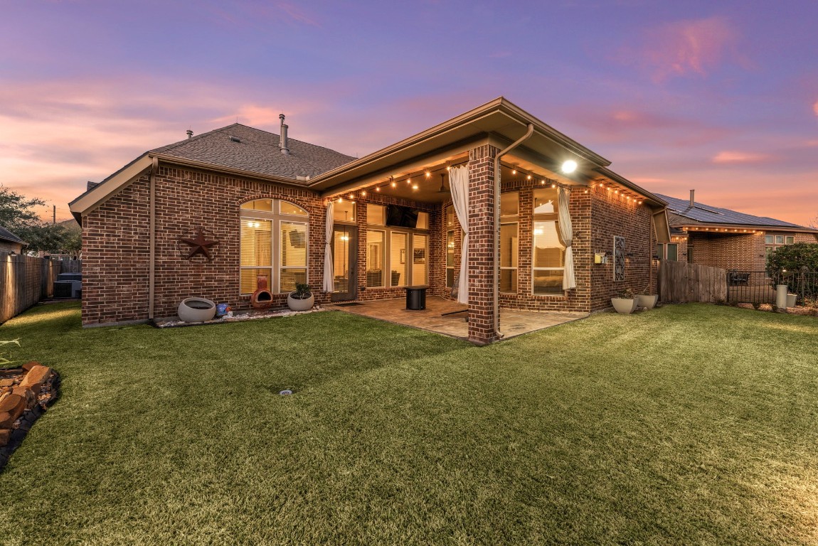 23211 Ruspino Shores Place Katy, TX 77493 - Photo 29 of 39 a front view of a house with garden