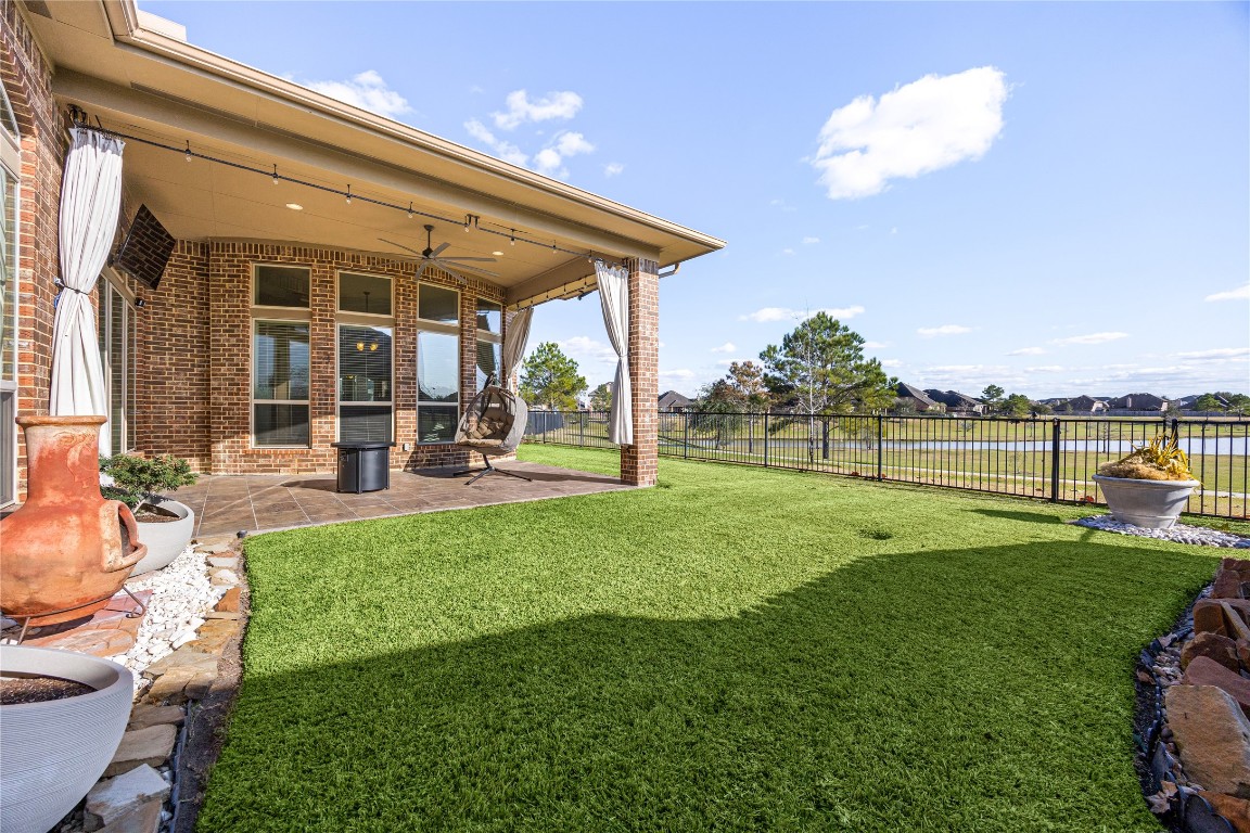 23211 Ruspino Shores Place Katy, TX 77493 - Photo 31 of 39 a view of a house with backyard and sitting area