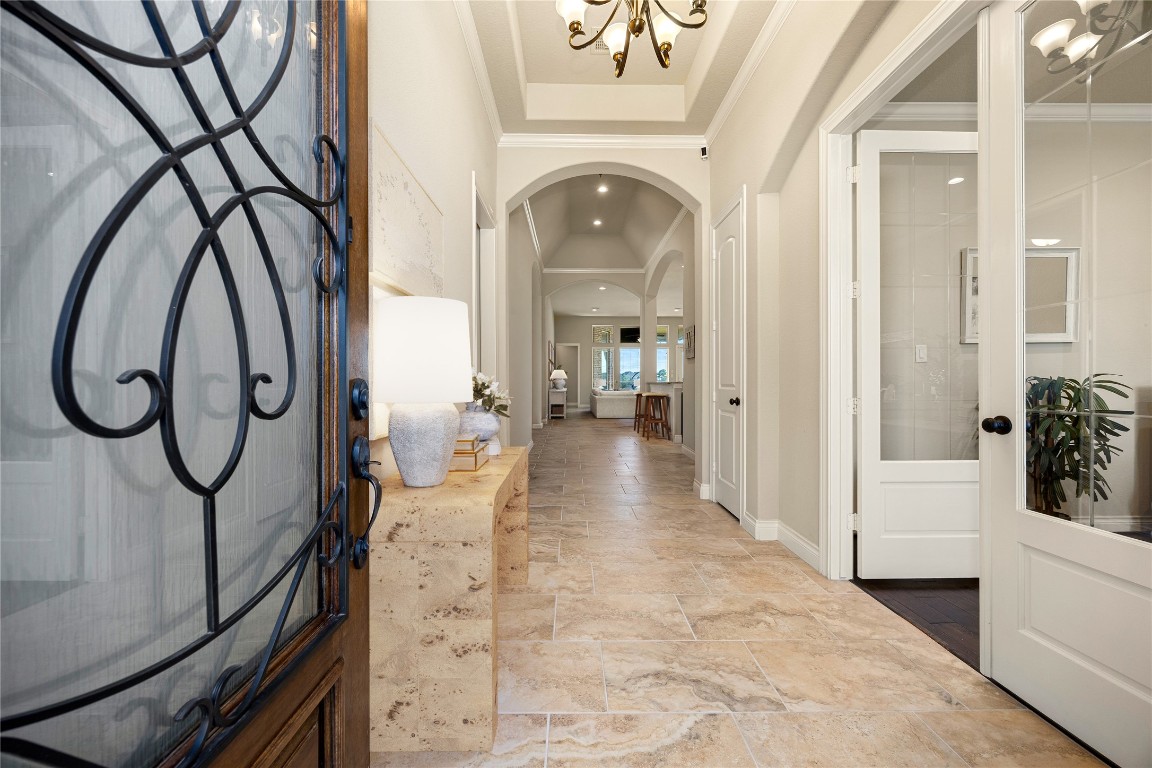 23211 Ruspino Shores Place Katy, TX 77493 - Photo 6 of 39 a view of a entryway door with hallway and wooden floor