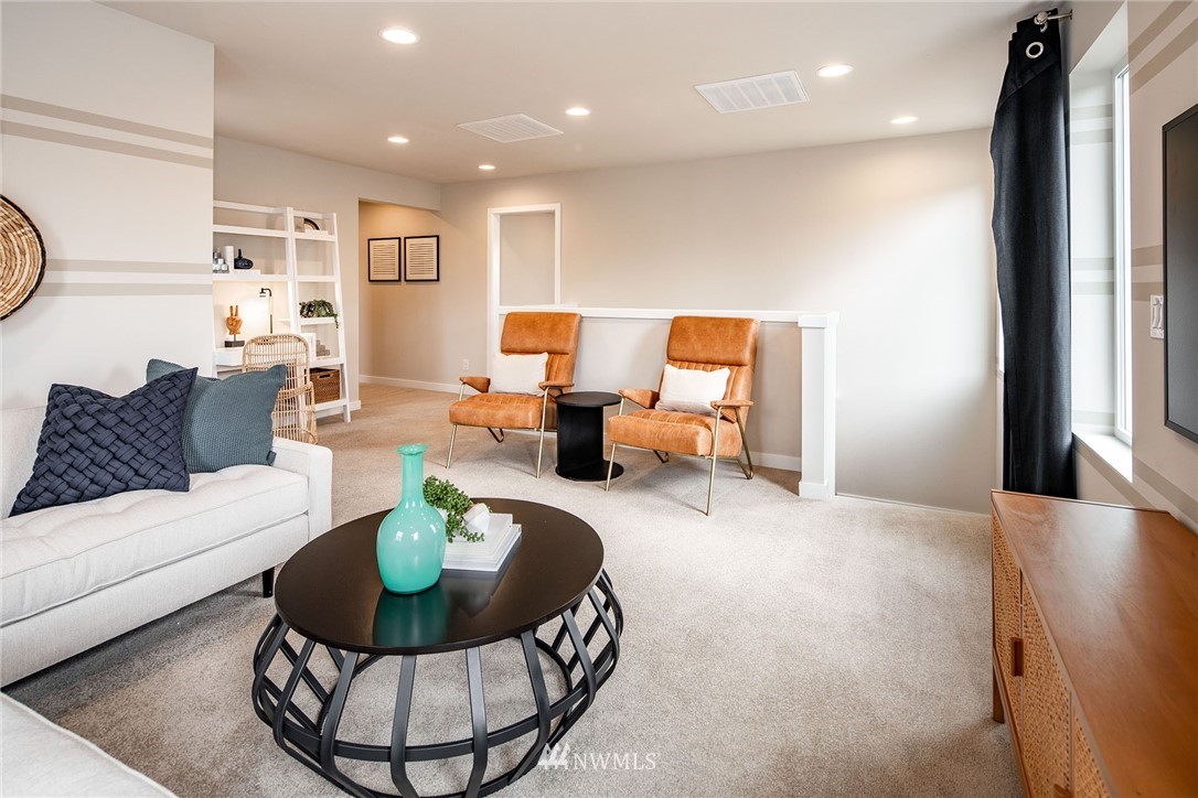 11 215th Street Southeast, Unit 1 Bothell, WA 98021 - Photo 11 of 18 a living room with furniture