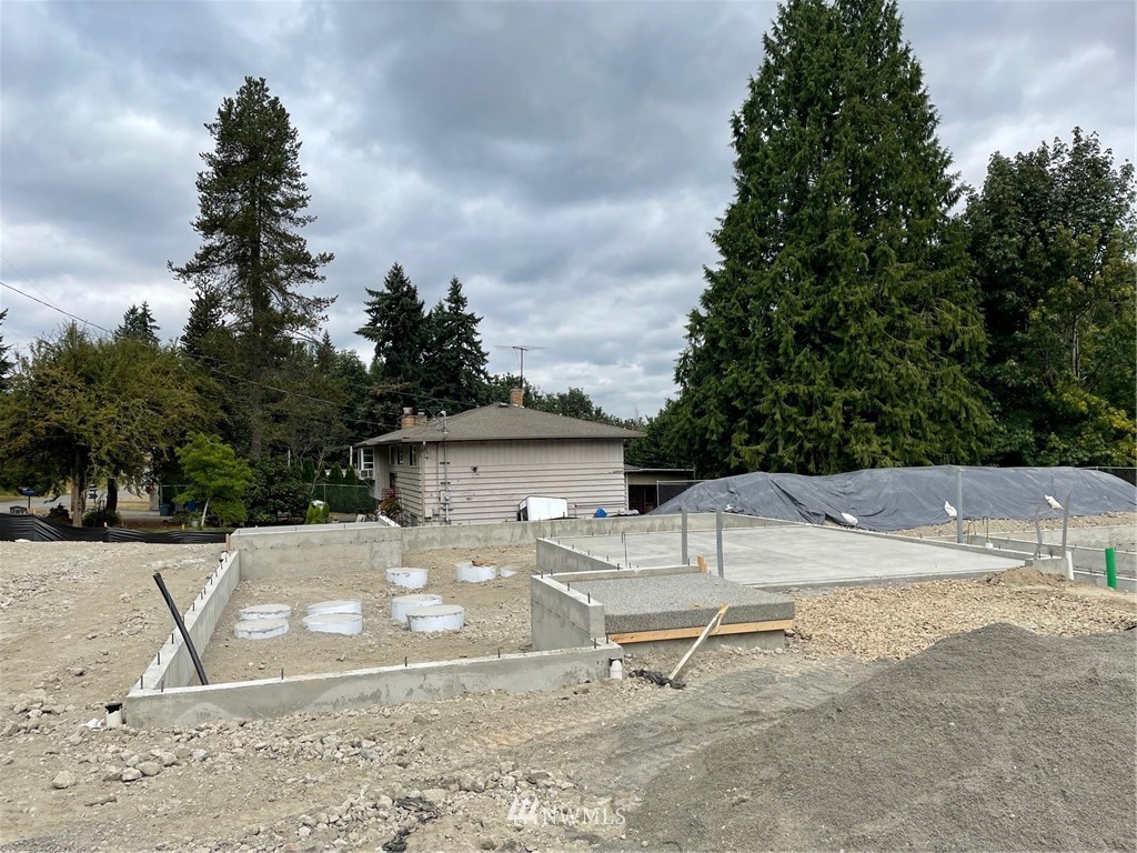 11 215th Street Southeast, Unit 1 Bothell, WA 98021 - Photo 4 of 18 a view of a outdoor space with a patio