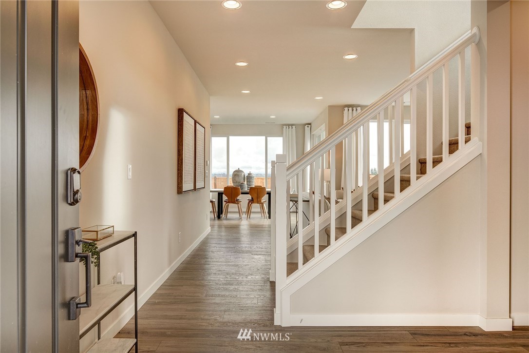 11 215th Street Southeast, Unit 1 Bothell, WA 98021 - Photo 5 of 18 a view of entryway and hall with wooden floor