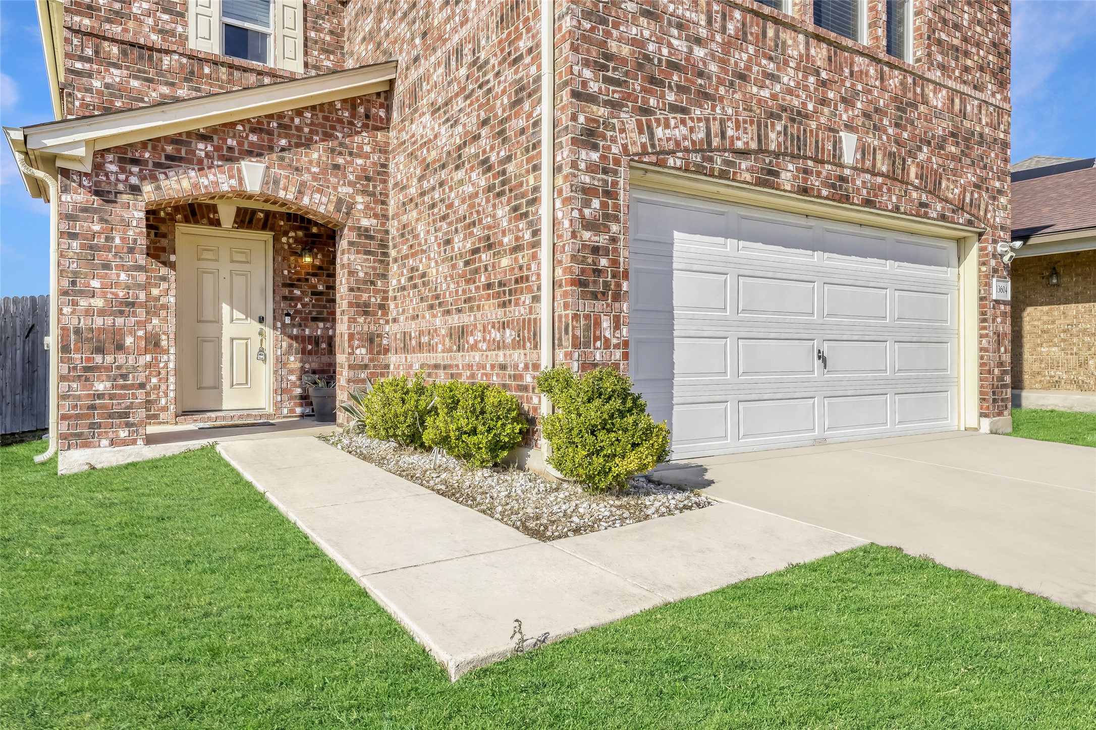 13604 Vigilance Street Manor, TX 78653 - Photo 24 of 28 front view of a house with a yard