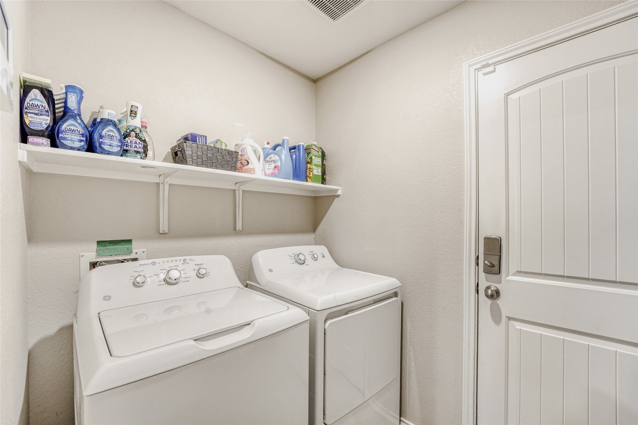 13604 Vigilance Street Manor, TX 78653 - Photo 3 of 28 a utility room with dryer and washer