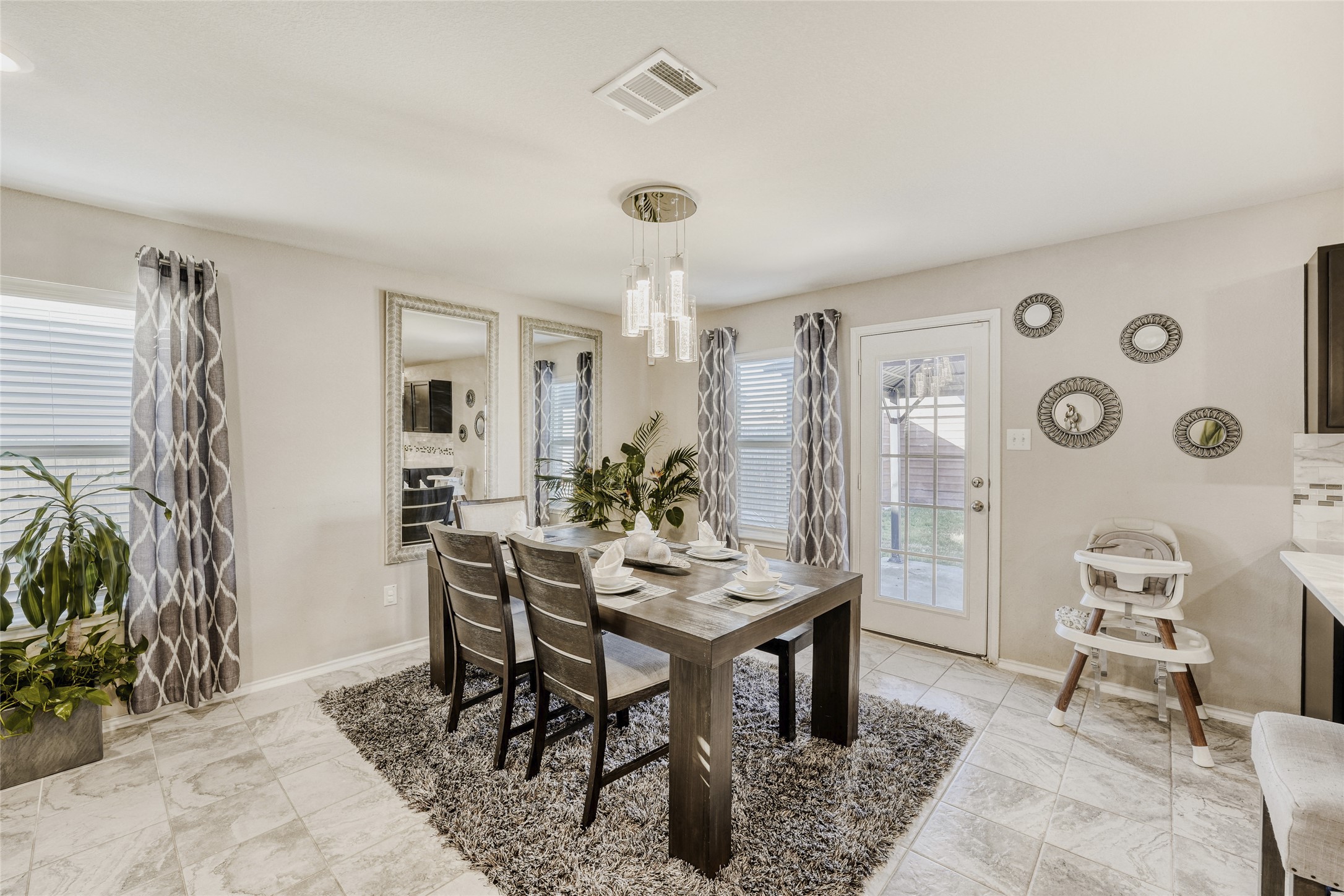 13604 Vigilance Street Manor, TX 78653 - Photo 5 of 28 a view of a livingroom and dining room