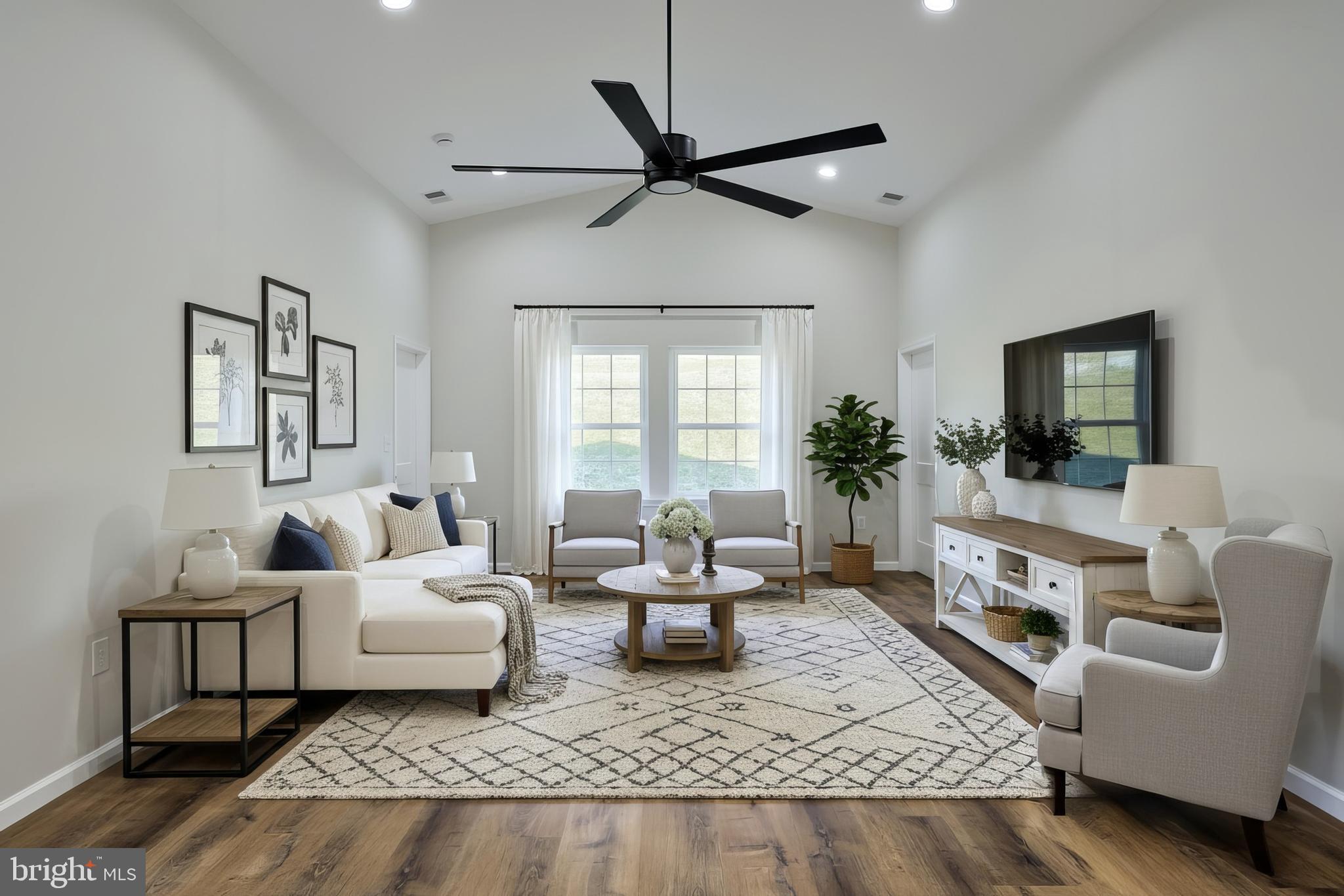 10640 Enfield Road Felton, PA 17322 - Photo 19 of 59 a living room with furniture and a flat screen tv
