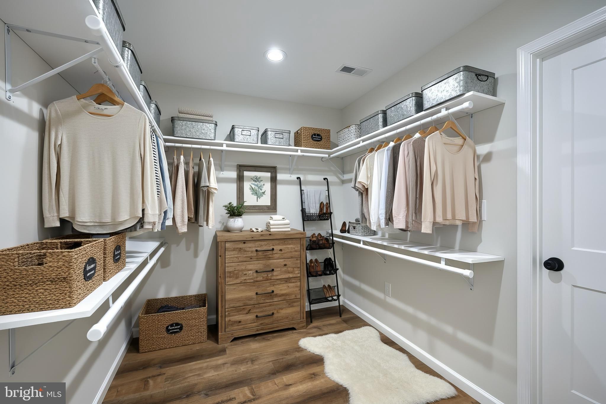 10640 Enfield Road Felton, PA 17322 - Photo 23 of 59 a view of walk in closet with clothes and shoes
