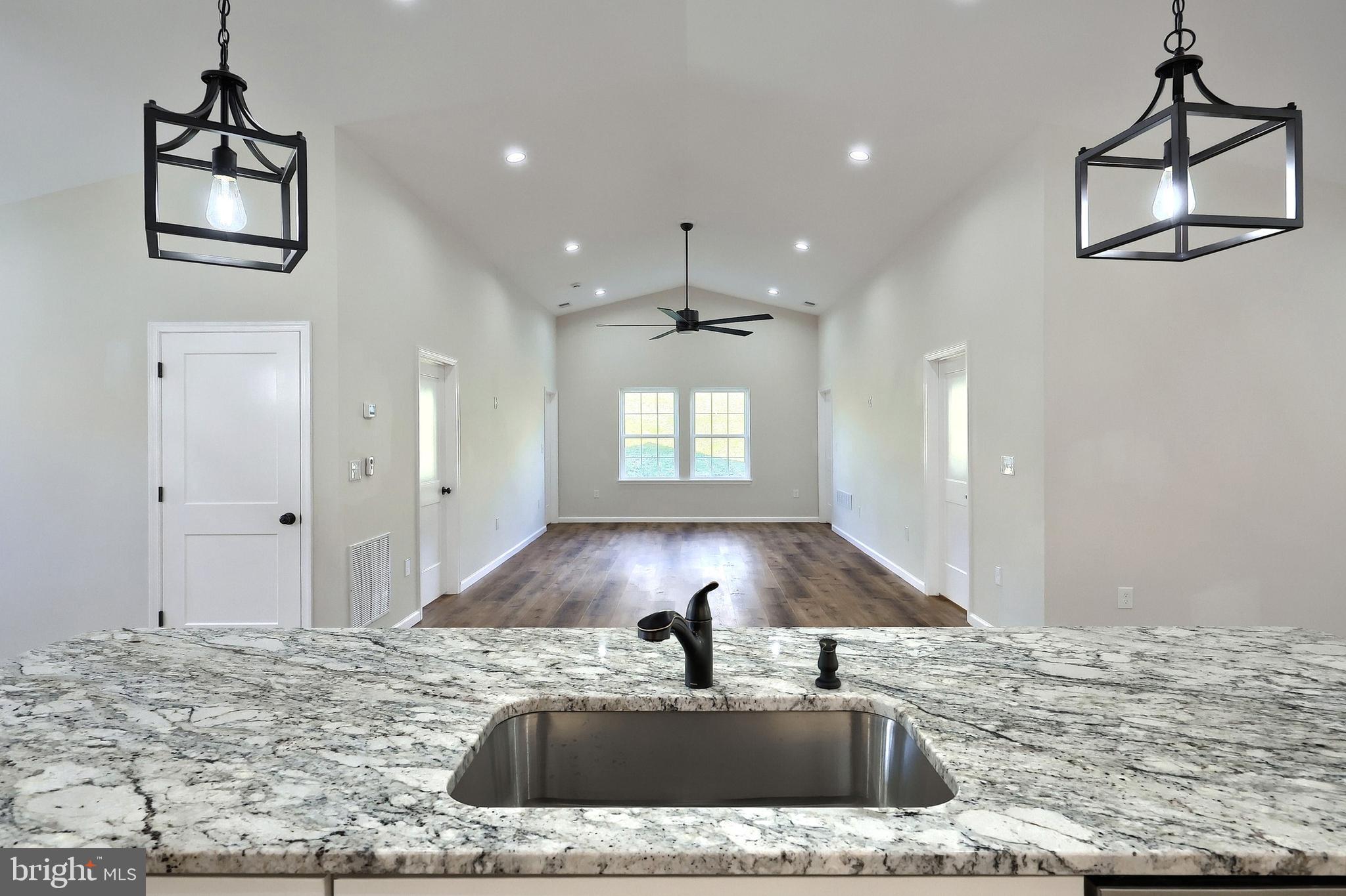 10640 Enfield Road Felton, PA 17322 - Photo 39 of 59 a kitchen with a sink and a refrigerator