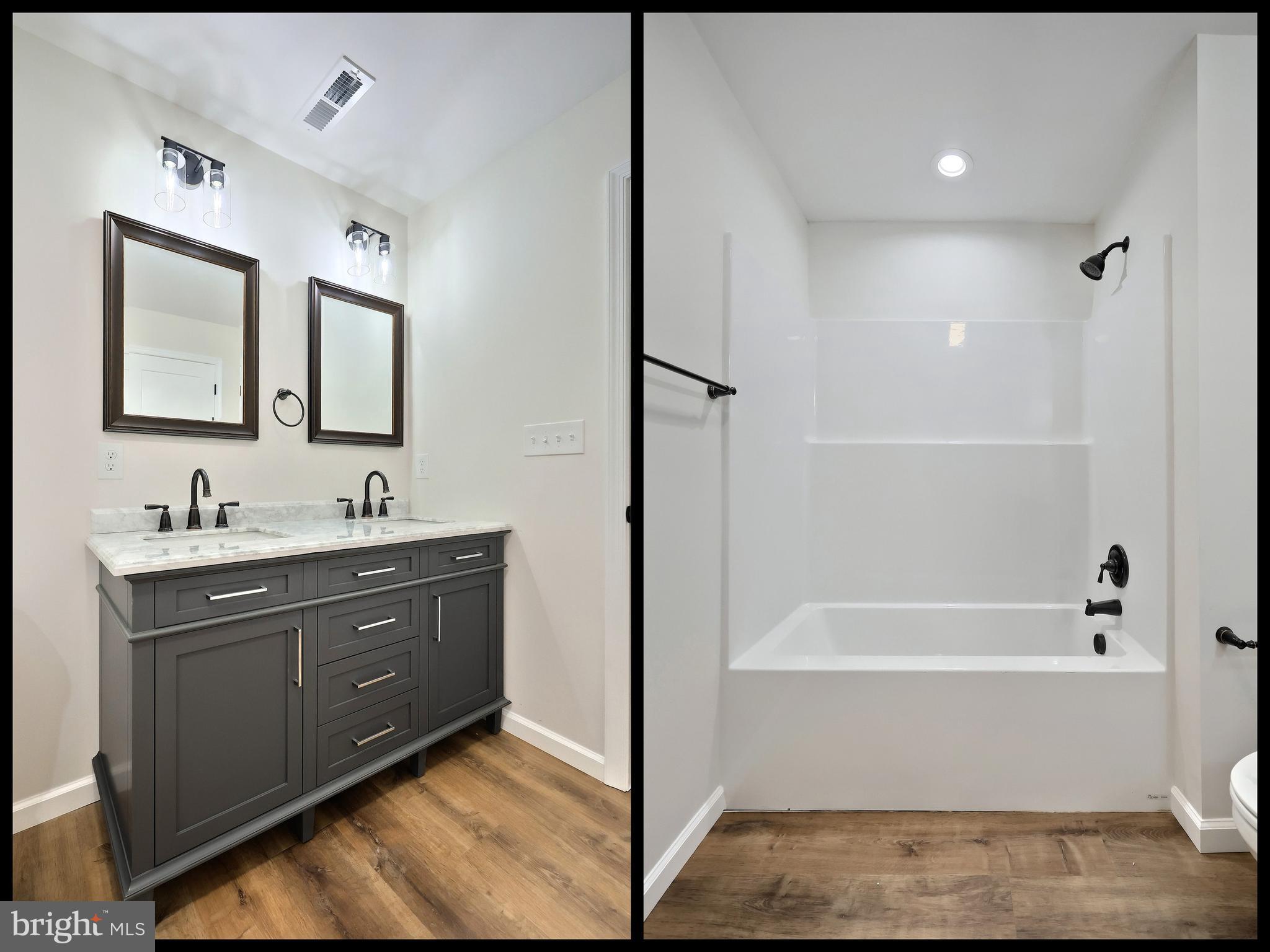 10640 Enfield Road Felton, PA 17322 - Photo 52 of 59 a bathroom with a tub sink shower and mirror