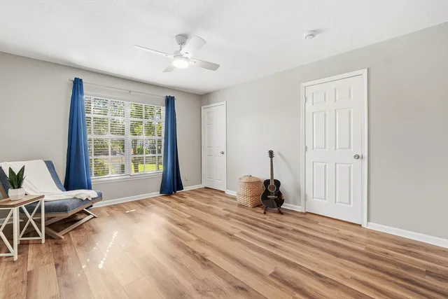 a view of swimming pool with a table and chairs