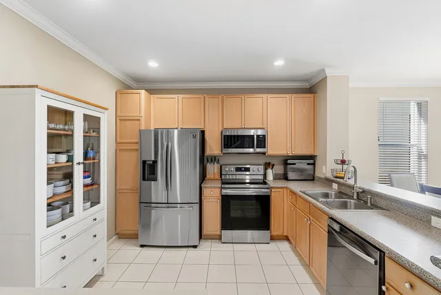 a workspace with wooden floor and a window