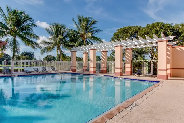 a view of a park with large trees