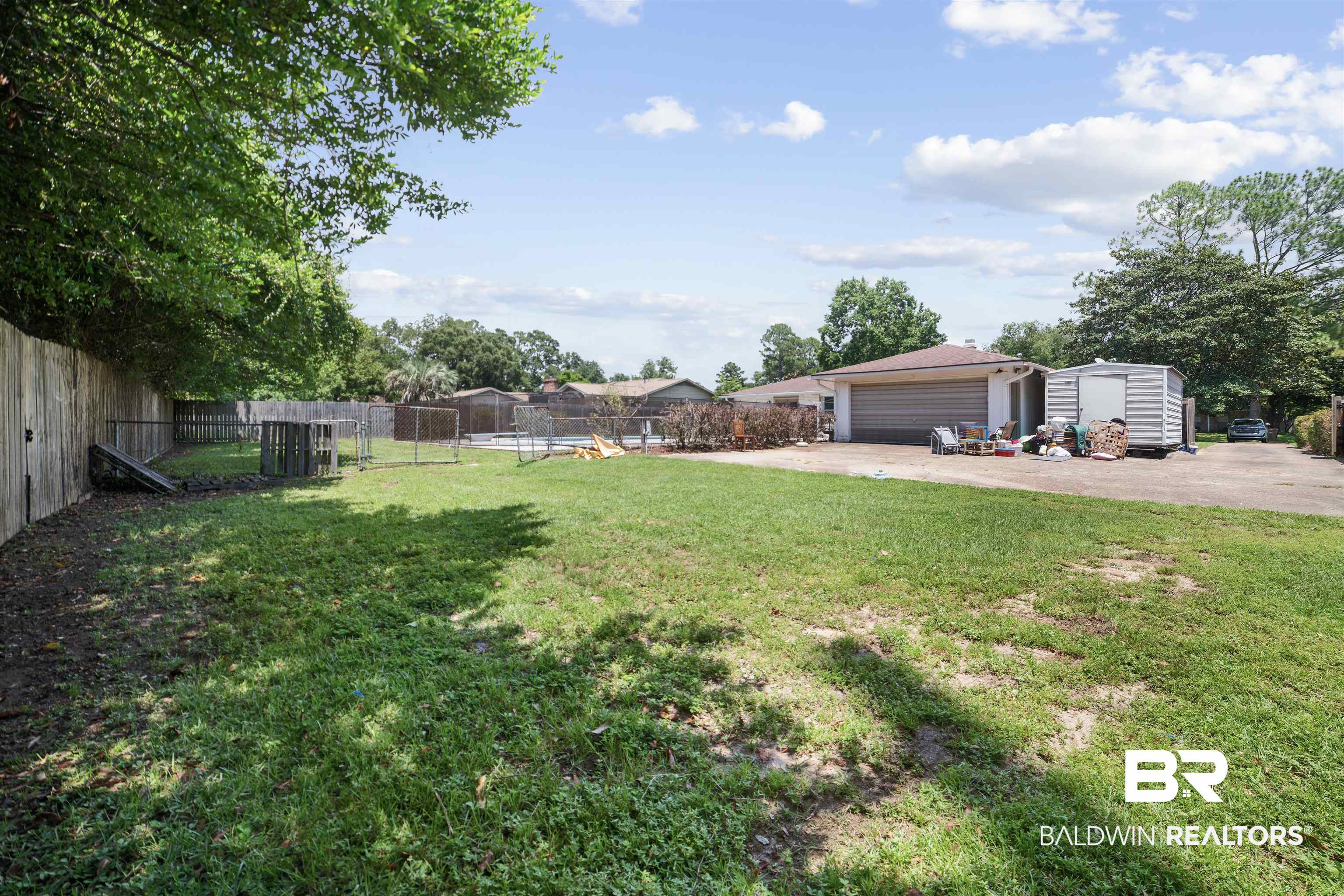 804 Regents Drive West Mobile, AL 36609 - Photo 33 of 35 View of yard with an outbuilding and a detached garage