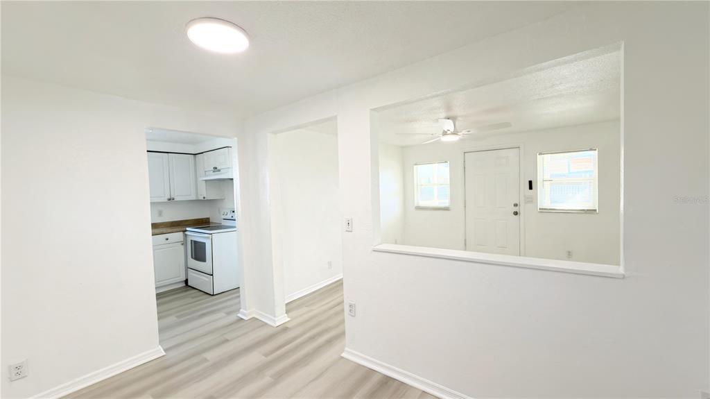 8204 North Semmes Street Tampa, FL 33604 - Photo 11 of 14 a view of a kitchen with a sink and a refrigerator