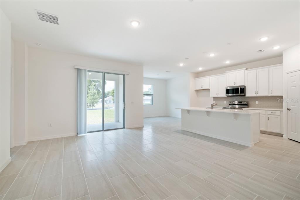 5942 Vision Road St. Cloud, FL 34771 - Photo 5 of 11 Great Rm / Kitchen