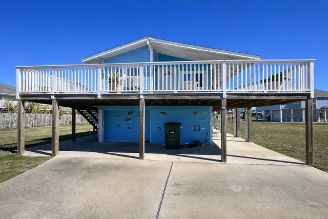 a view of porch with a yard