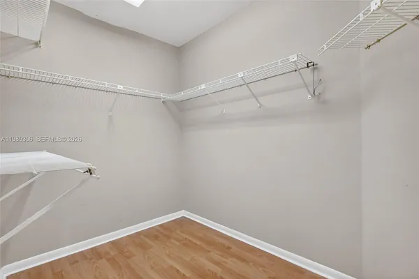 a view of a room with racks on the wall