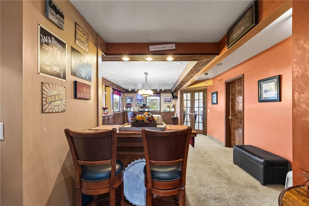 1140 Willits Road Ontario, NY 14519 - Photo 22 of 50 Bar/counter area leading to family room.