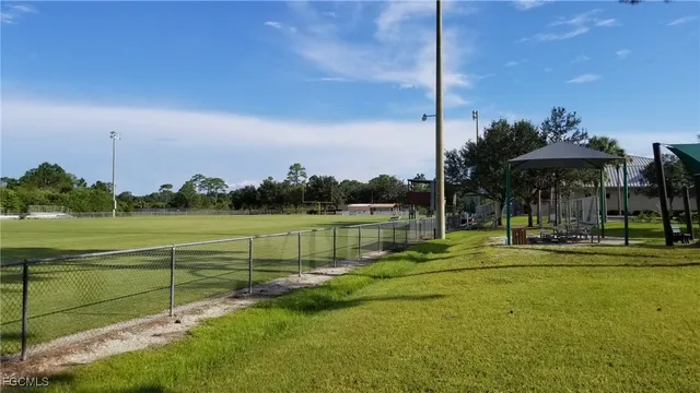 a view of a lake with a big yard