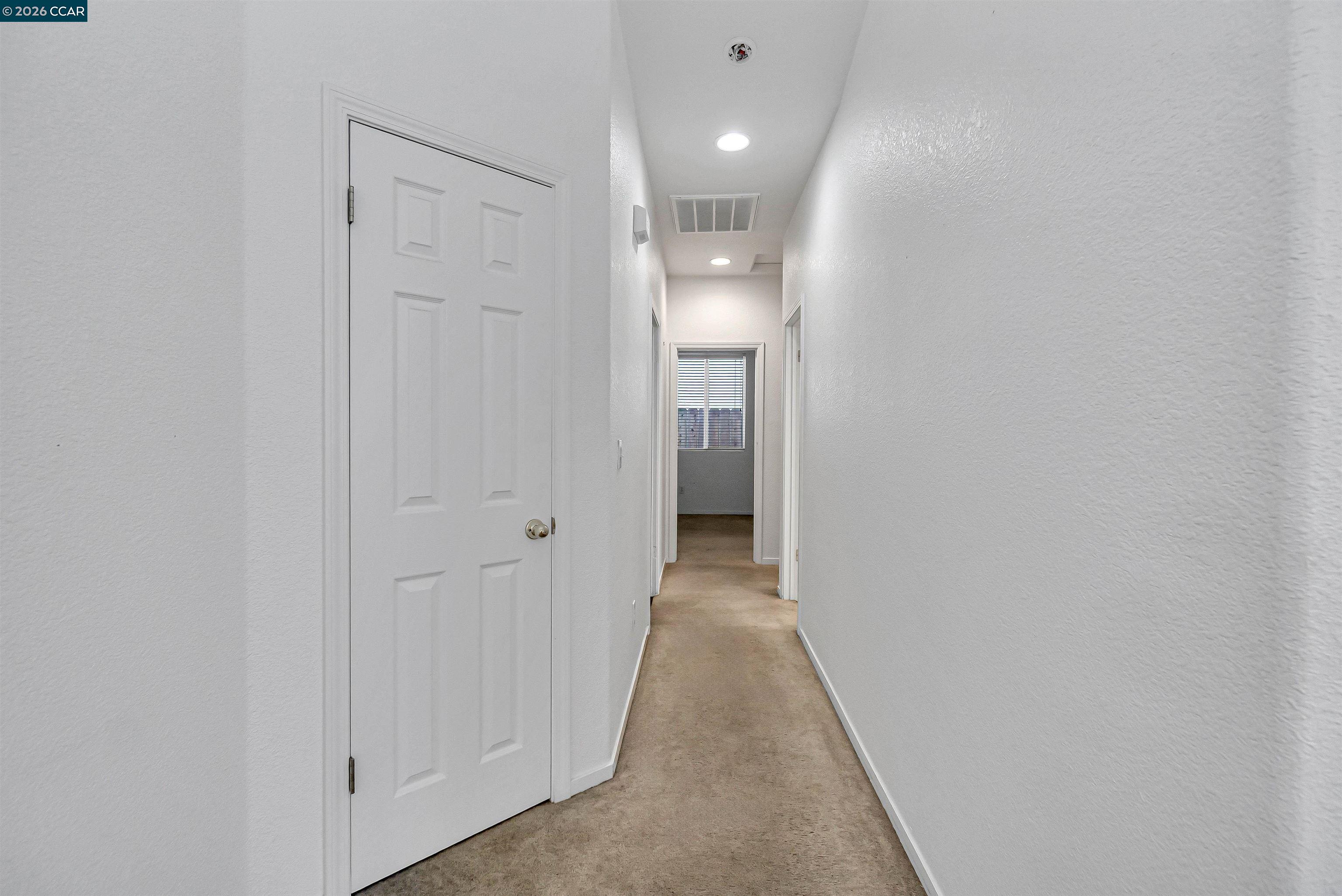 686 Anderson Way Rio Vista, CA 94571 - Photo 16 of 36 a view of a hallway with wooden floor
