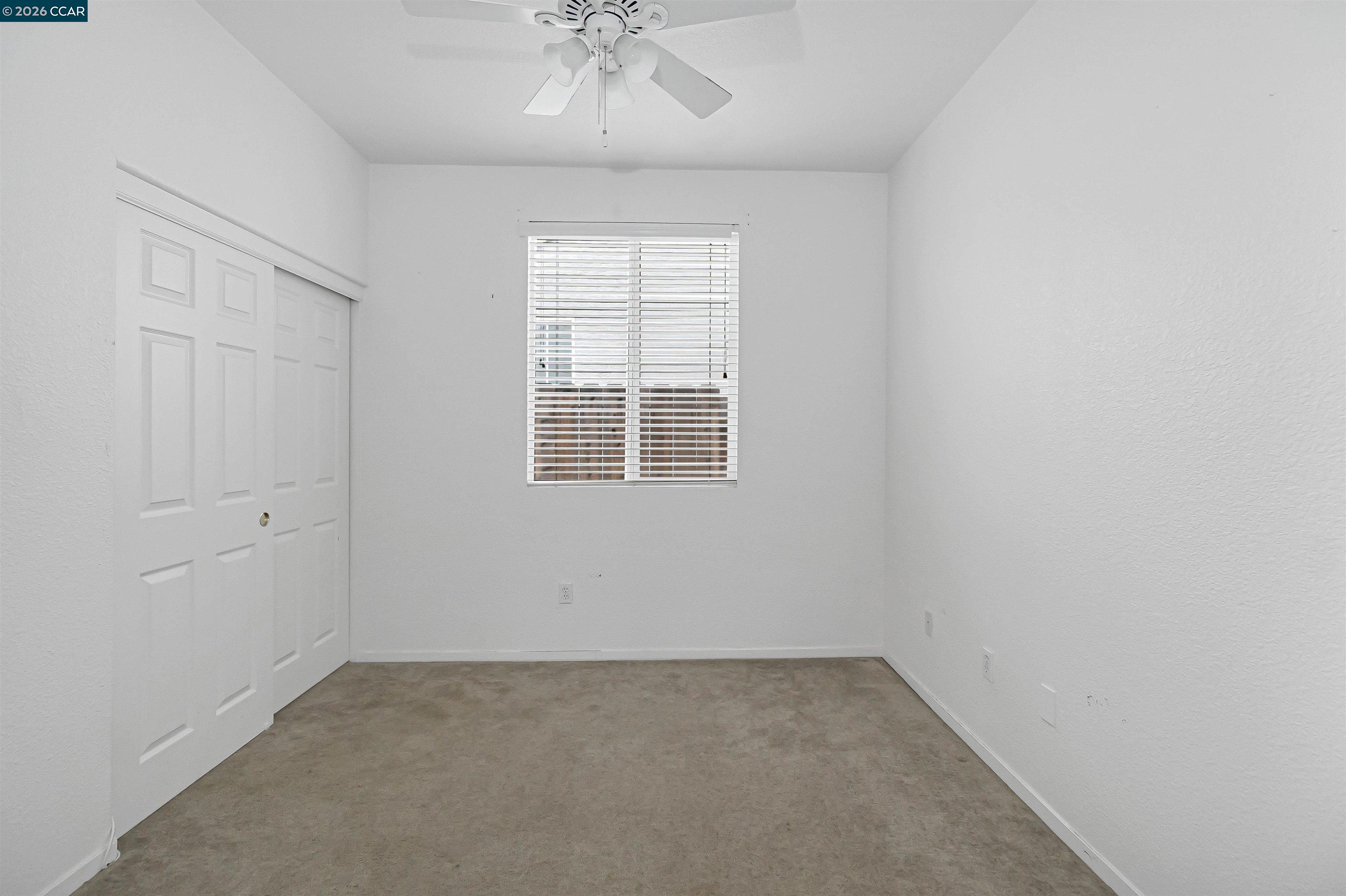 686 Anderson Way Rio Vista, CA 94571 - Photo 18 of 36 an empty room with a empty space and windows