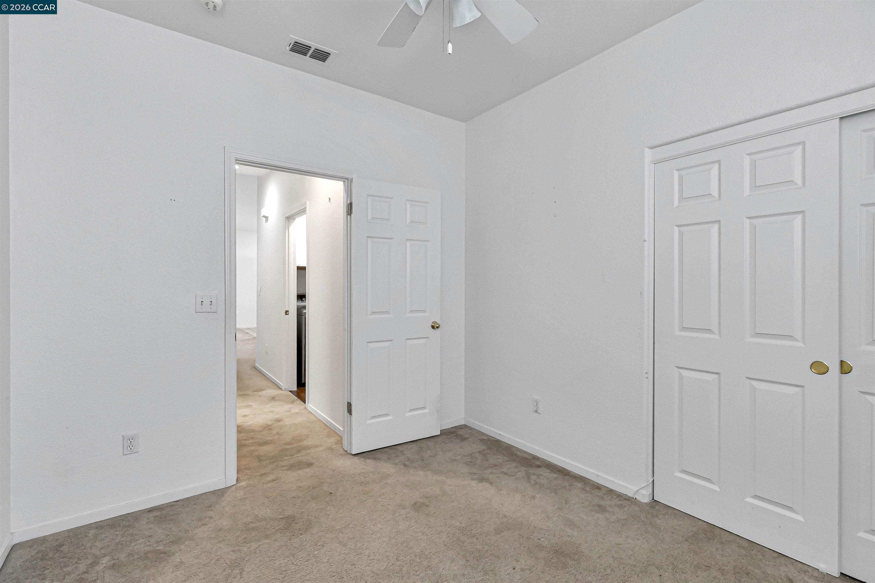 686 Anderson Way Rio Vista, CA 94571 - Photo 19 of 36 an empty room with windows