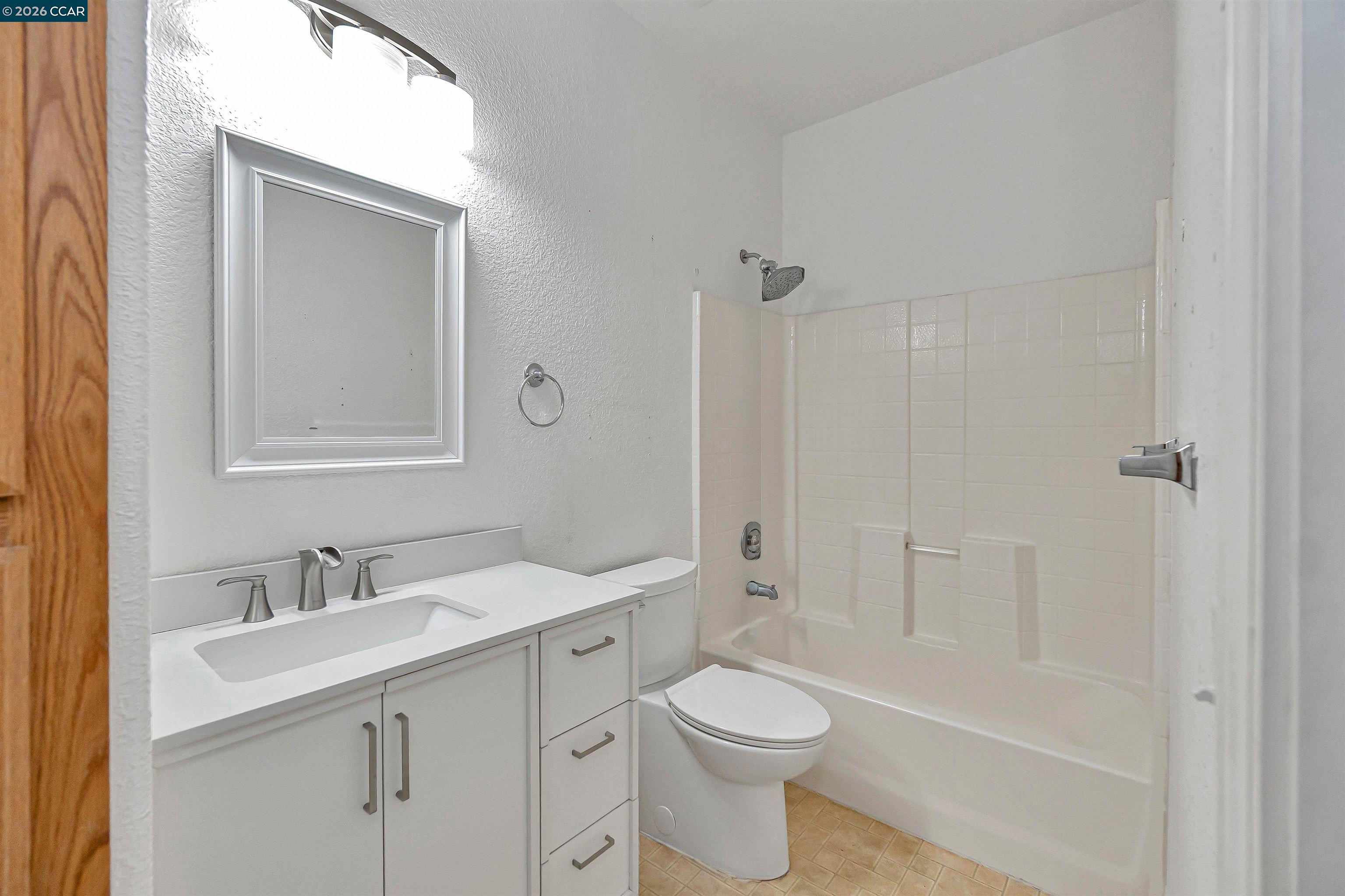 686 Anderson Way Rio Vista, CA 94571 - Photo 20 of 36 a bathroom with a sink a toilet and shower