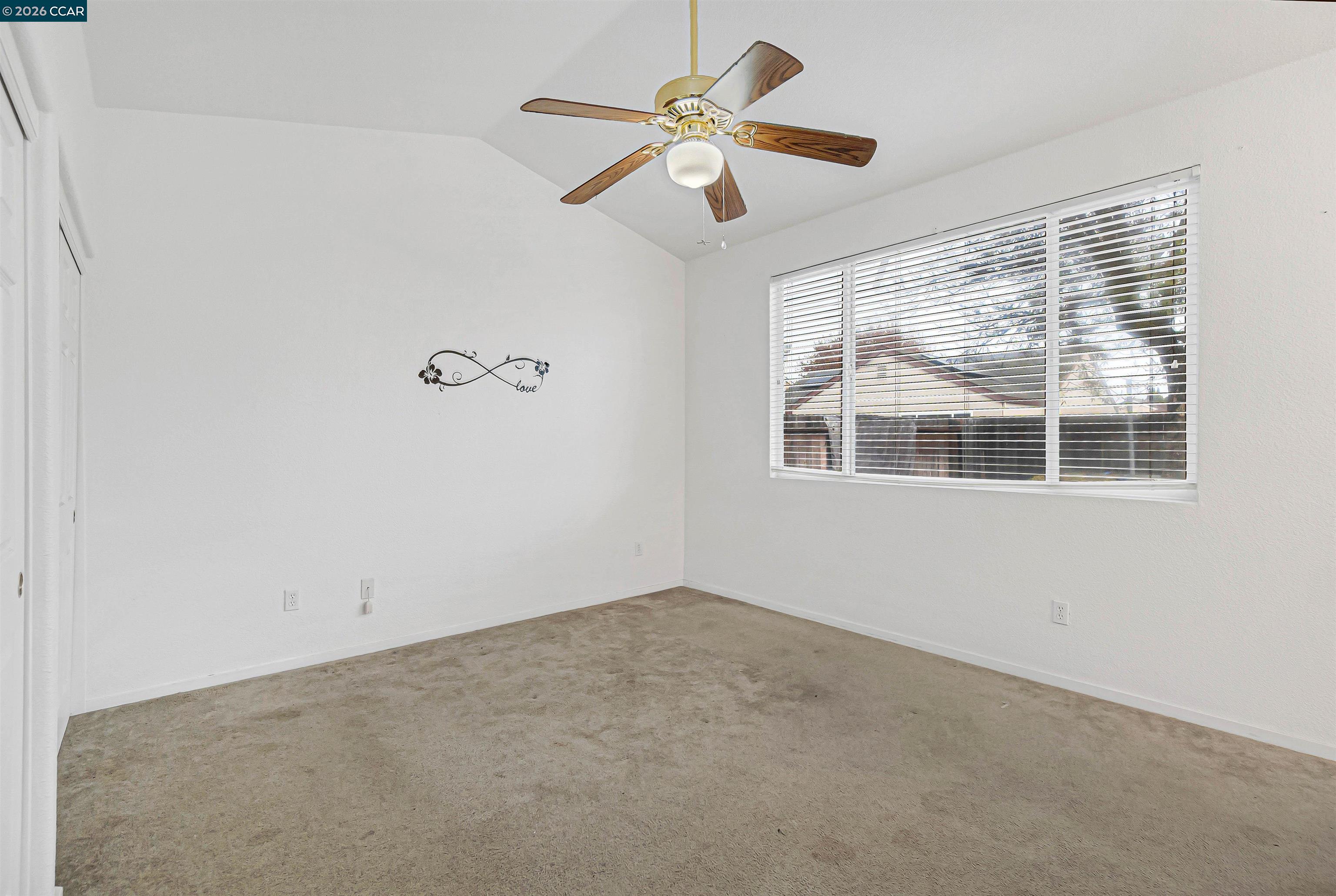 686 Anderson Way Rio Vista, CA 94571 - Photo 25 of 36 an empty room with a window and a fan